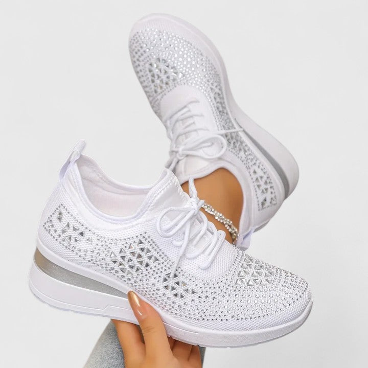 Poppy signature everyday sneakers shown in a range of colours