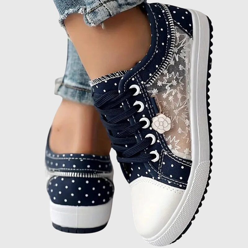 Comfortable lace-up sneakers in soft blue tones for everyday wear