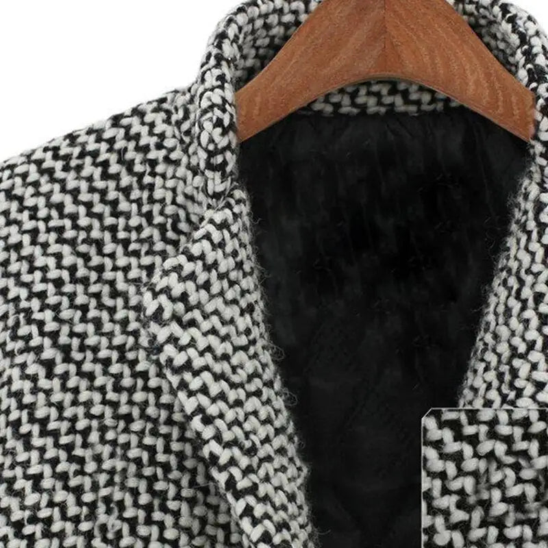 Amara long wool coat shown in a tailored, elegant silhouette for everyday layering