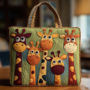 Quilted tote bag in giraffe print with structured stitching and carry handles