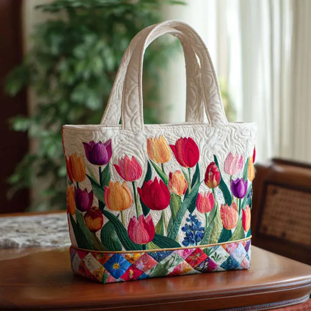 Quilted tote bag in a floral tulip garden print with structured stitched texture