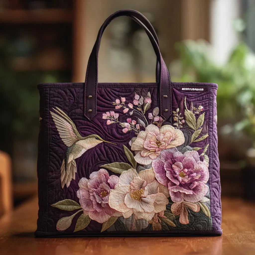 Quilted tote bag with a hummingbirds and orchids print
