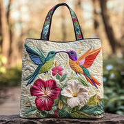 Quilted bag with hummingbird and white floral design in two sizes