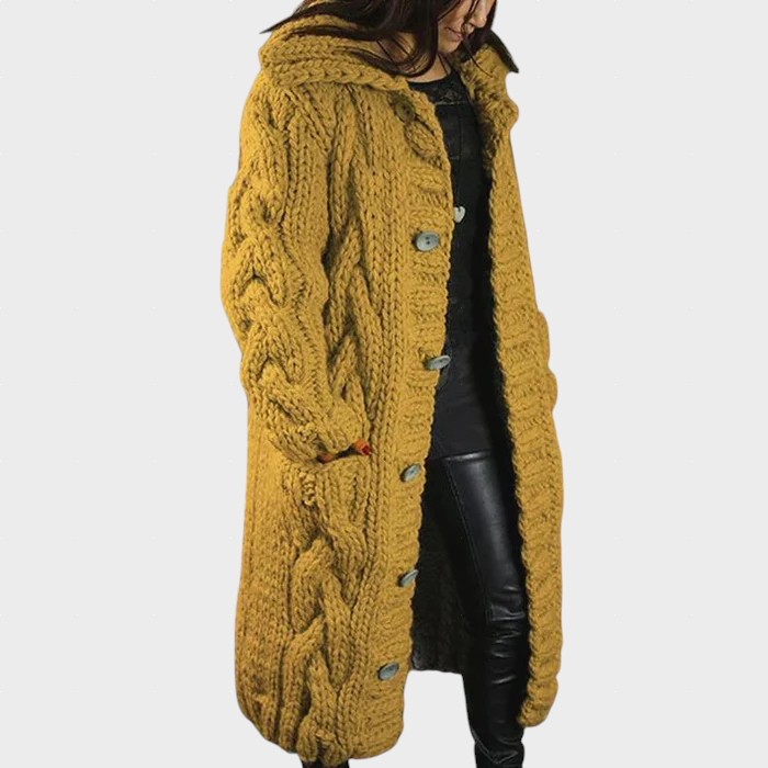 Karina oversized cable knit longline hooded coat shown in a soft neutral shade