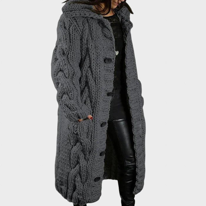 Karina oversized cable knit longline hooded coat shown in a soft neutral shade