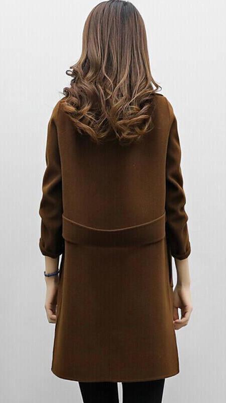 Celina long trench coat shown in green, a tailored full-length womens outerwear piece