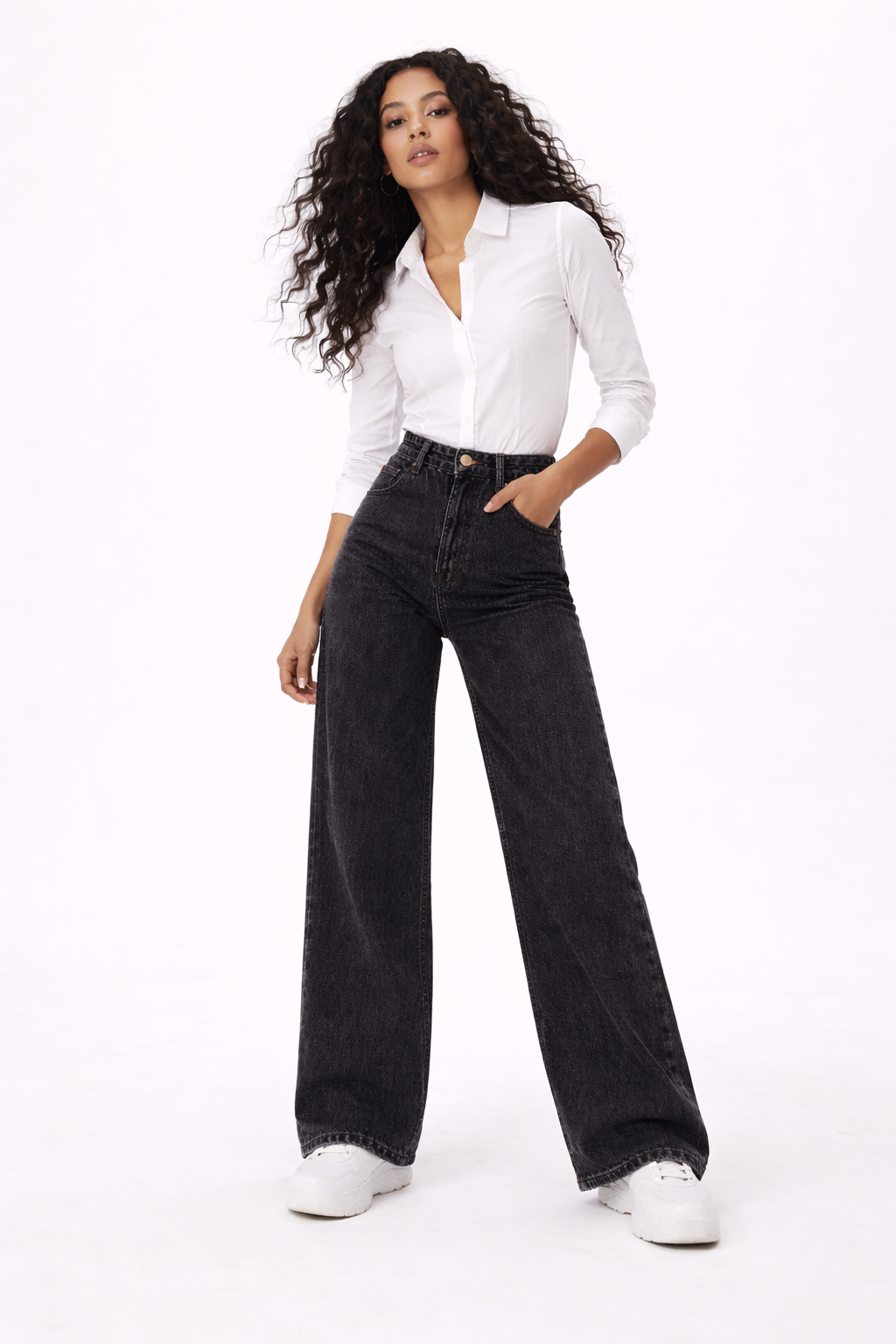 Ines black dark flare jeans shown in a flattering full-length flare cut