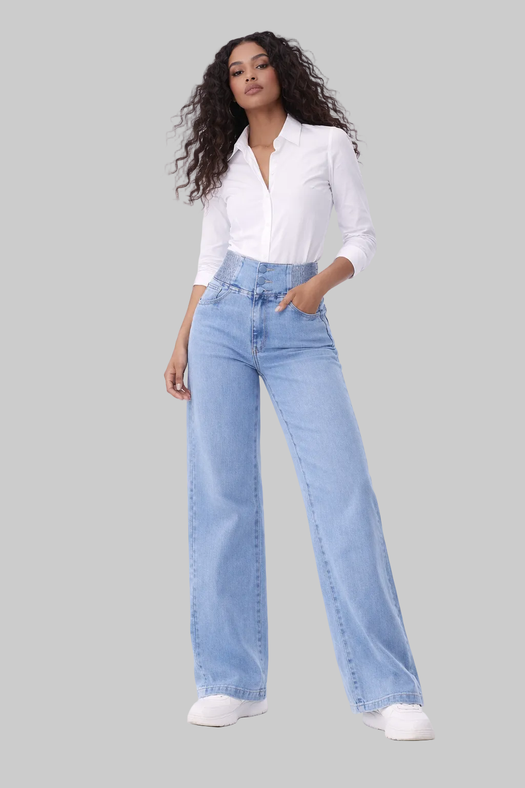 Amara blue elastic high-waist flare jeans shown on a model