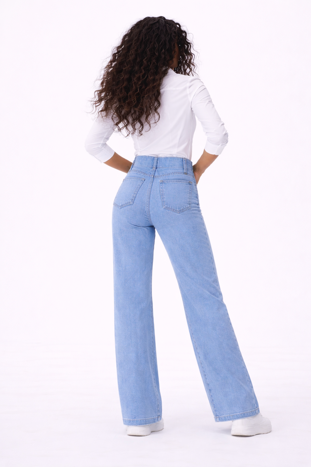 Amara blue elastic high-waist flare jeans shown on a model