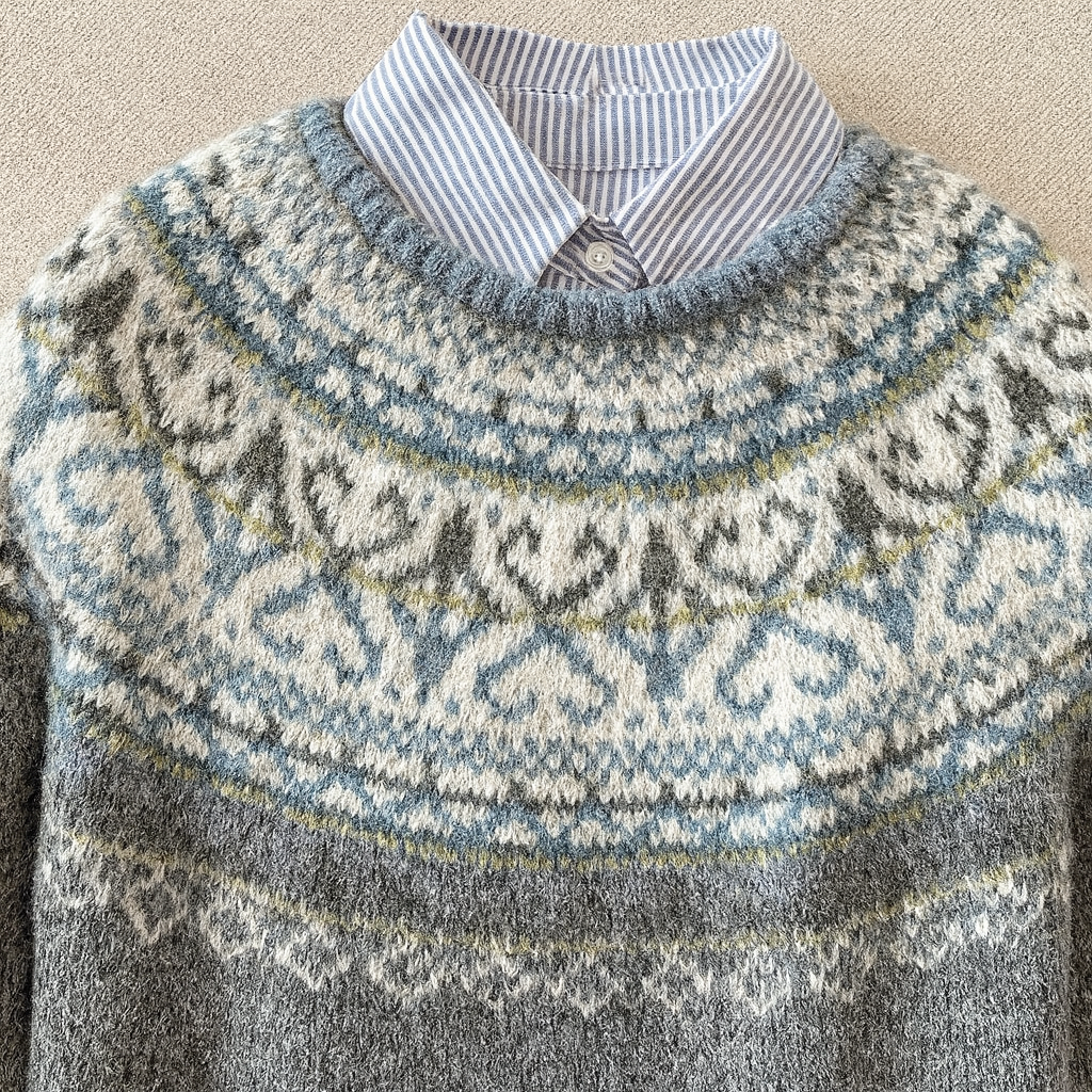Grey vintage-inspired knit sweater with soft texture and relaxed, flattering fit