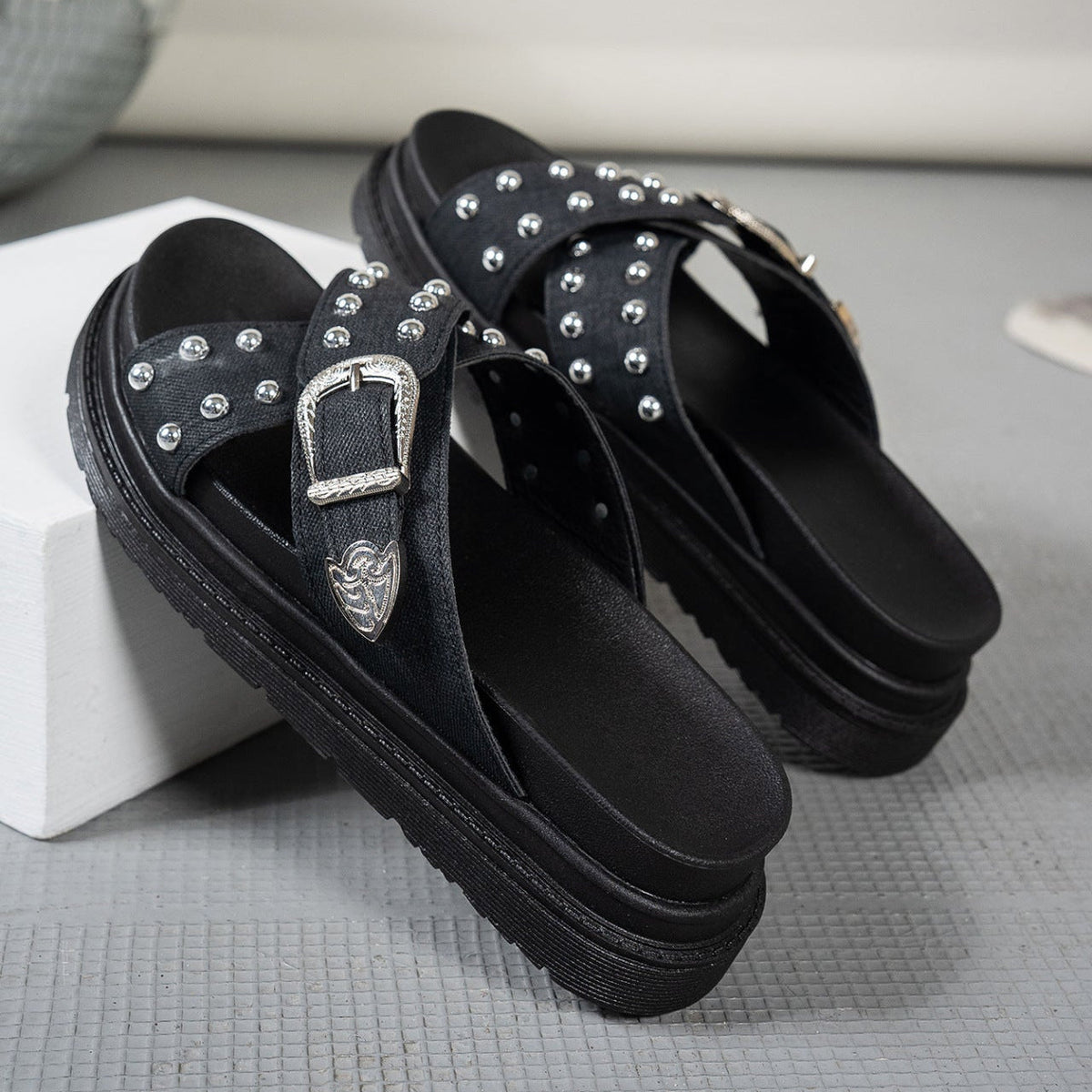 Chunky platform buckle sandals with crossed straps and metallic bead detailing