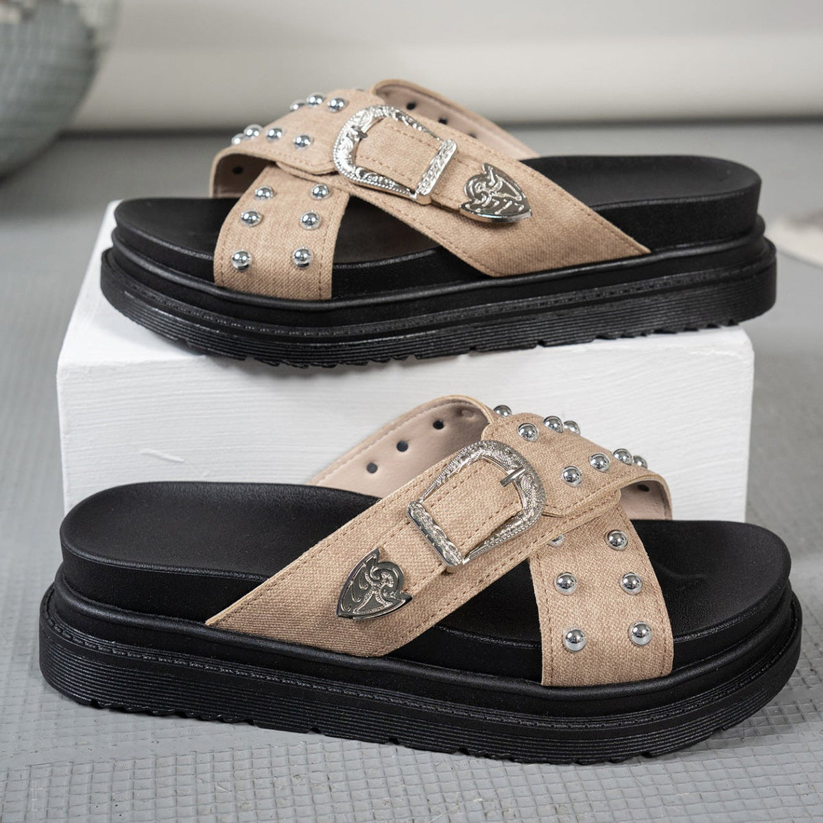 Chunky platform buckle sandals with crossed straps and metallic bead detailing
