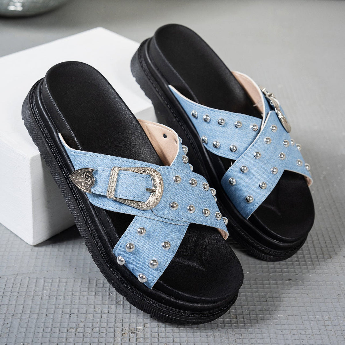 Chunky platform buckle sandals with crossed straps and metallic bead detailing