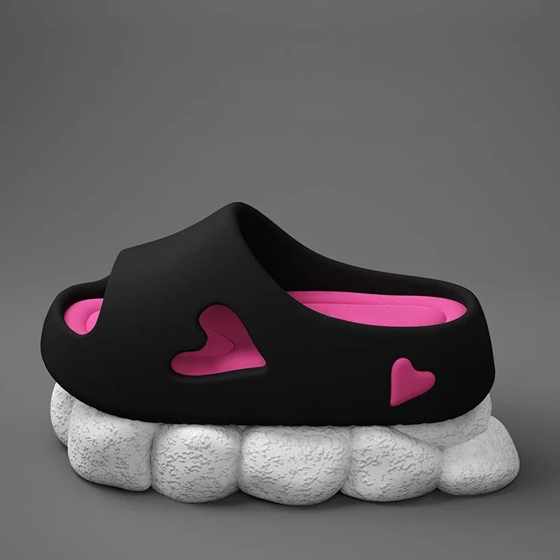 Heart-detail cushioned platform slides shown in purple, khaki, black and white