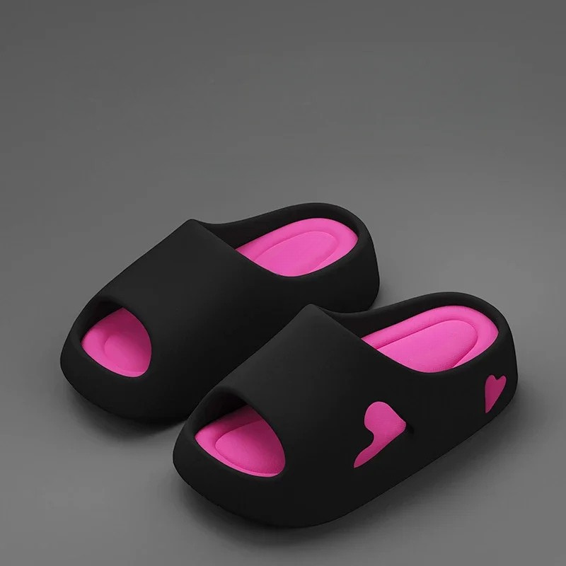 Heart-detail cushioned platform slides shown in purple, khaki, black and white