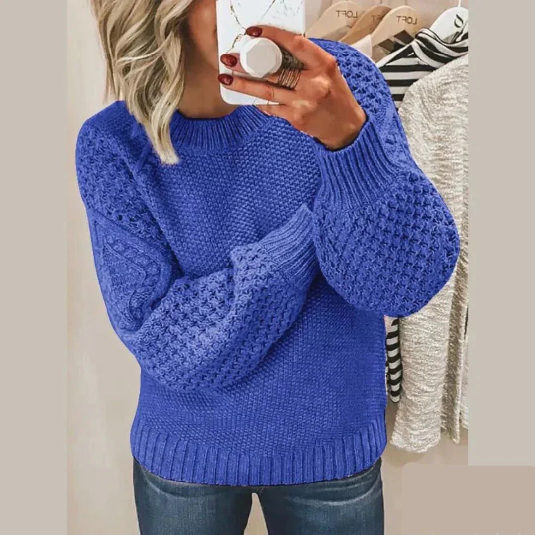 Kirti classic wool sweater with cosy knit texture, shown in soft colours