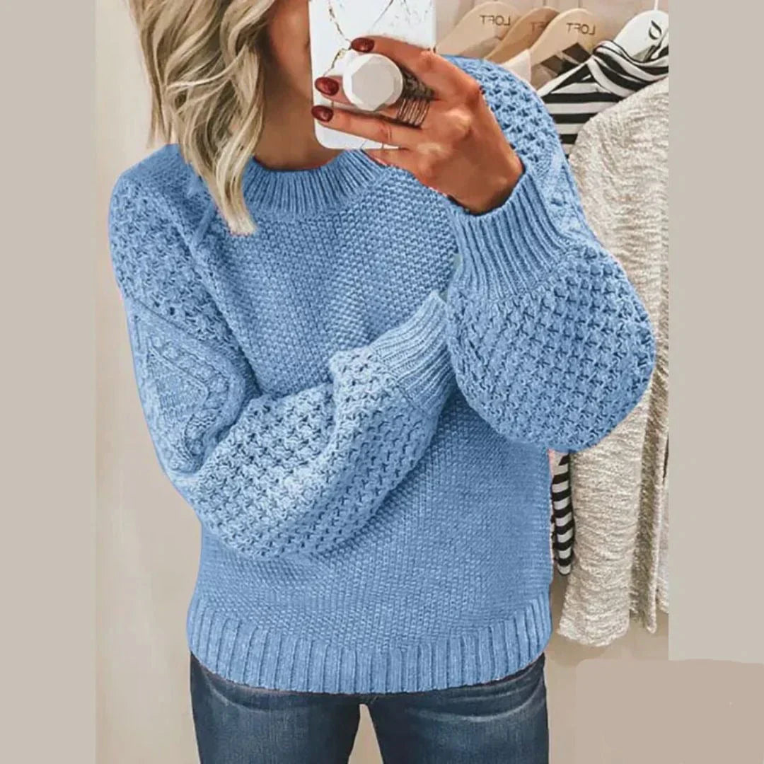Kirti classic wool sweater with cosy knit texture, shown in soft colours