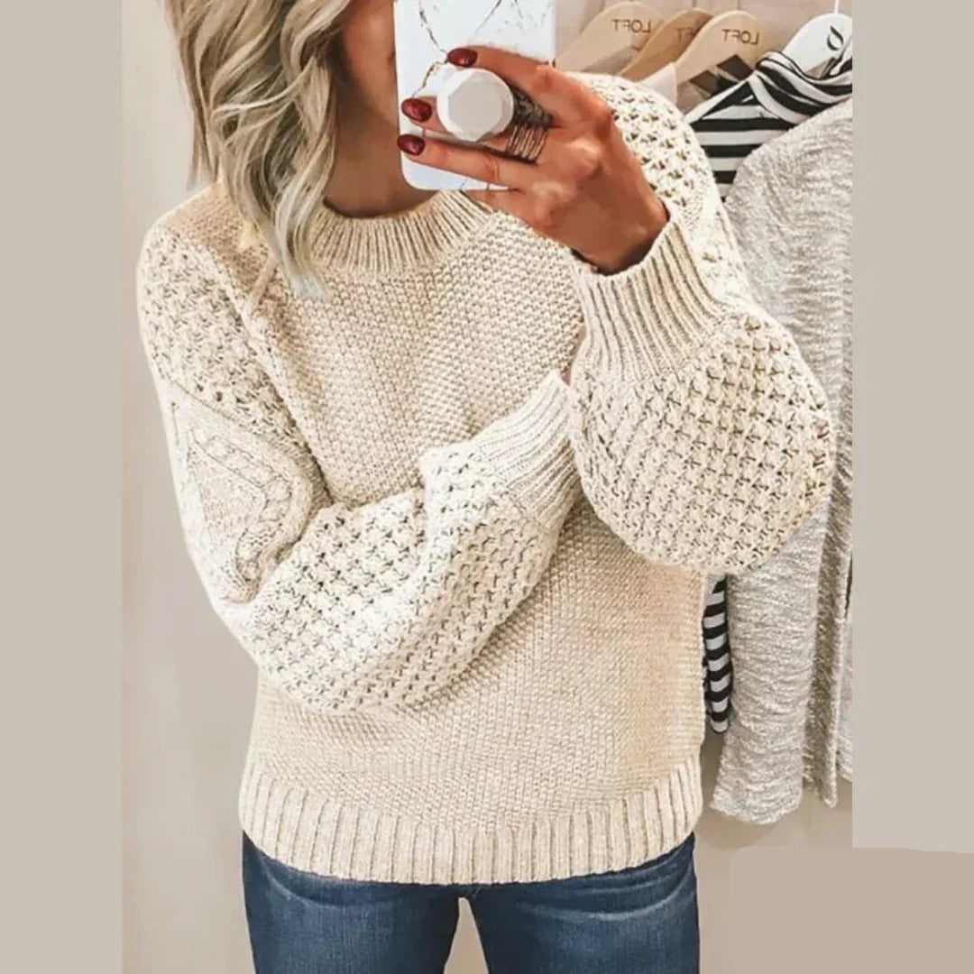Kirti classic wool sweater with cosy knit texture, shown in soft colours