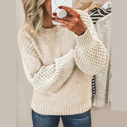 Kirti classic wool sweater with cosy knit texture, shown in soft colours