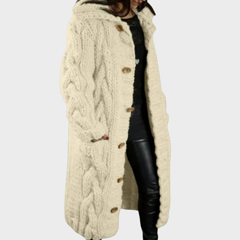 Karina oversized cable knit longline hooded coat shown in a soft neutral shade