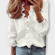 Isadora elegant summer blouse shown in soft white, light blue, mint and orange colours