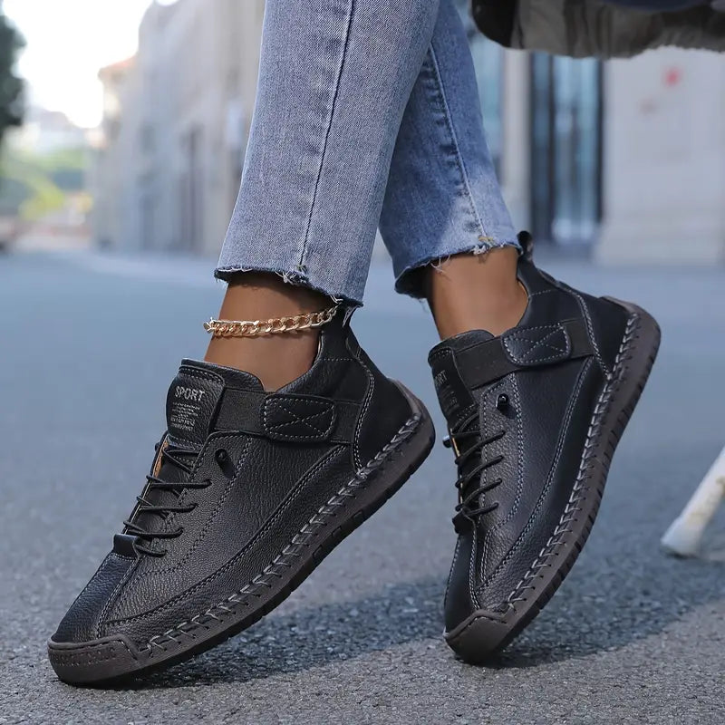 Reva cushioned slip-on leather sneakers shown in white, black and colour options