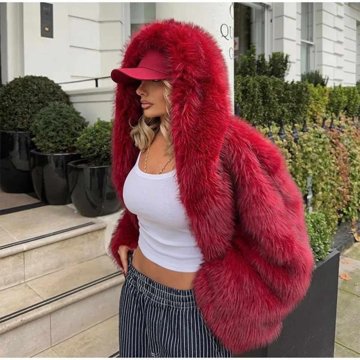 Stella hooded faux fur coat shown in green, brown, rose red and red