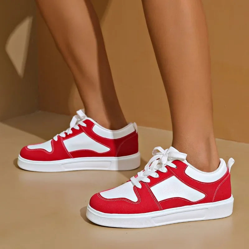 Cushioned low-top lace-up sneakers with breathable panels and treaded sole