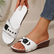 Matte buckle strap platform sandals with side rivet details in white, black and burgundy
