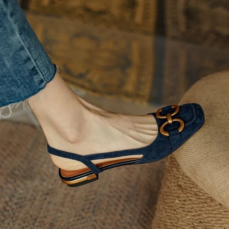 Leather slingback flat with vamp buckle, side cutout and squared toe