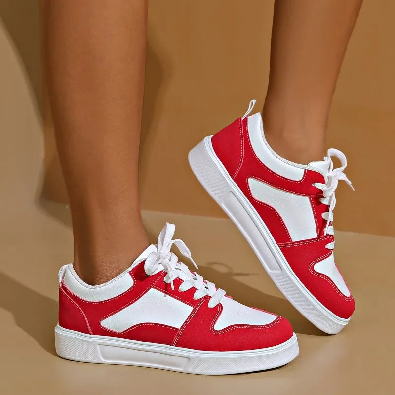 Cushioned low-top lace-up sneakers with breathable panels and treaded sole