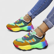 Comfortable women's slip-on sneakers shown in green and blue colourways