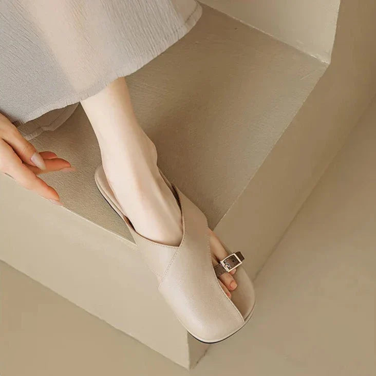 Semi-closed leather slippers with a low heel and open toe in ivory and khaki