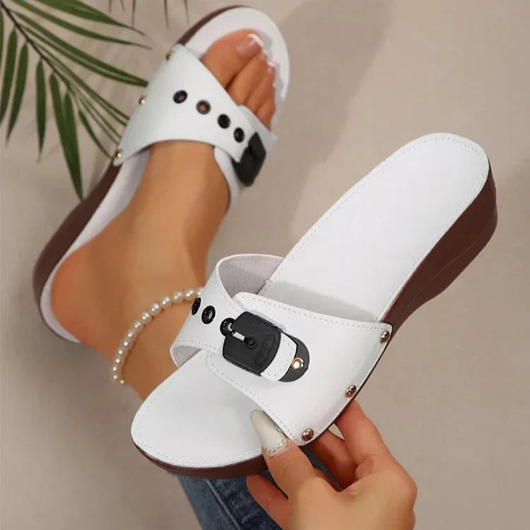 Matte buckle strap platform sandals with side rivet details in white, black and burgundy