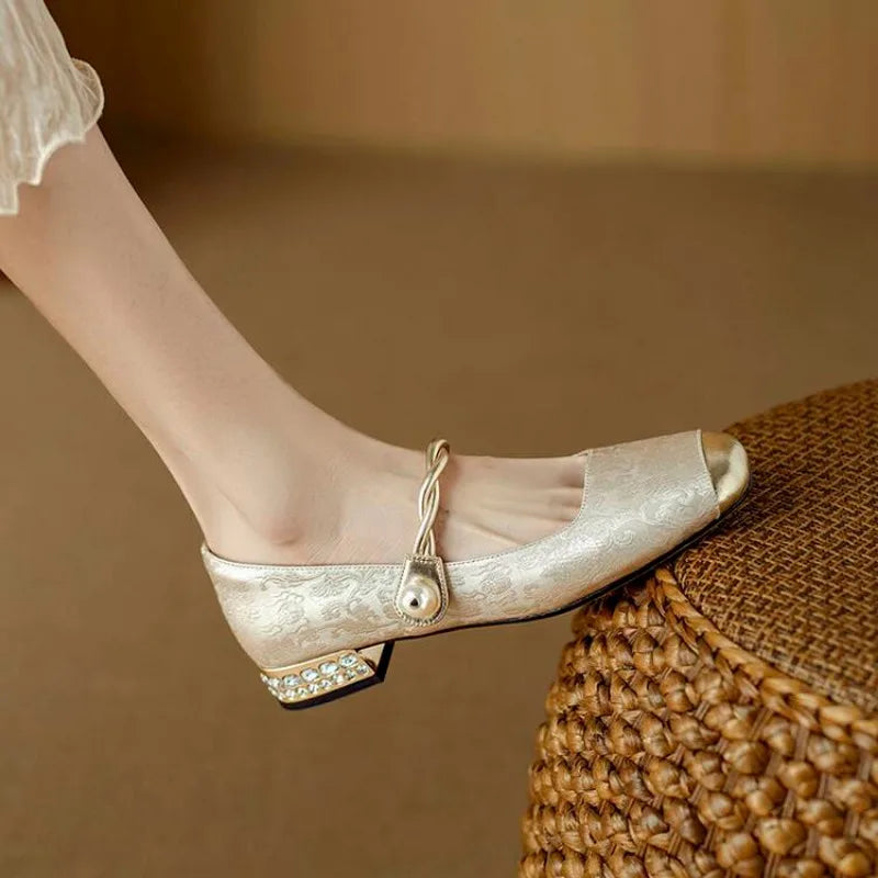 Brocade flats with gold-toned pearl strap and crystal-studded low block heel