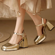 Flare heel closed-toe leather sandals in gold and silver
