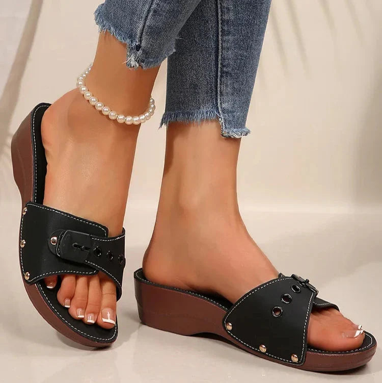 Matte buckle strap platform sandals with side rivet details in white, black and burgundy