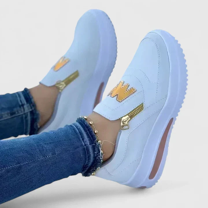 Comfortable everyday slip-on shoes shown in red, white, blue and black