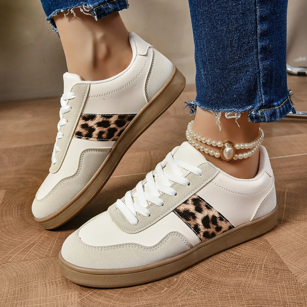 Leopard-print low-top sneakers with suede-texture panels in beige and black