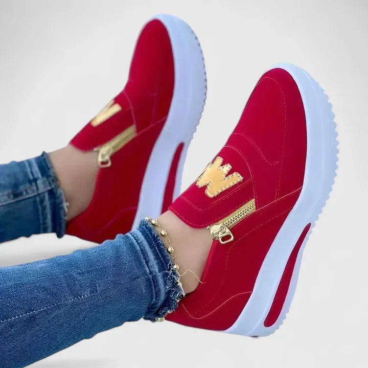 Comfortable everyday slip-on shoes shown in red, white, blue and black