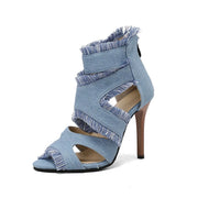Open-toe canvas stiletto heels with cutout design, raw-edge fringe and back zipper