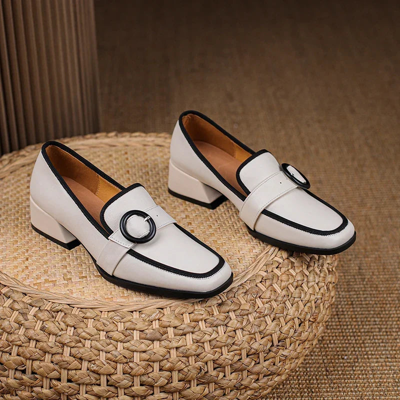 Premium Italian leather slip-on loafers with a low heel in black, white and khaki