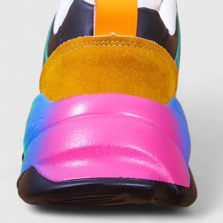 Comfortable women's slip-on sneakers shown in green and blue colourways
