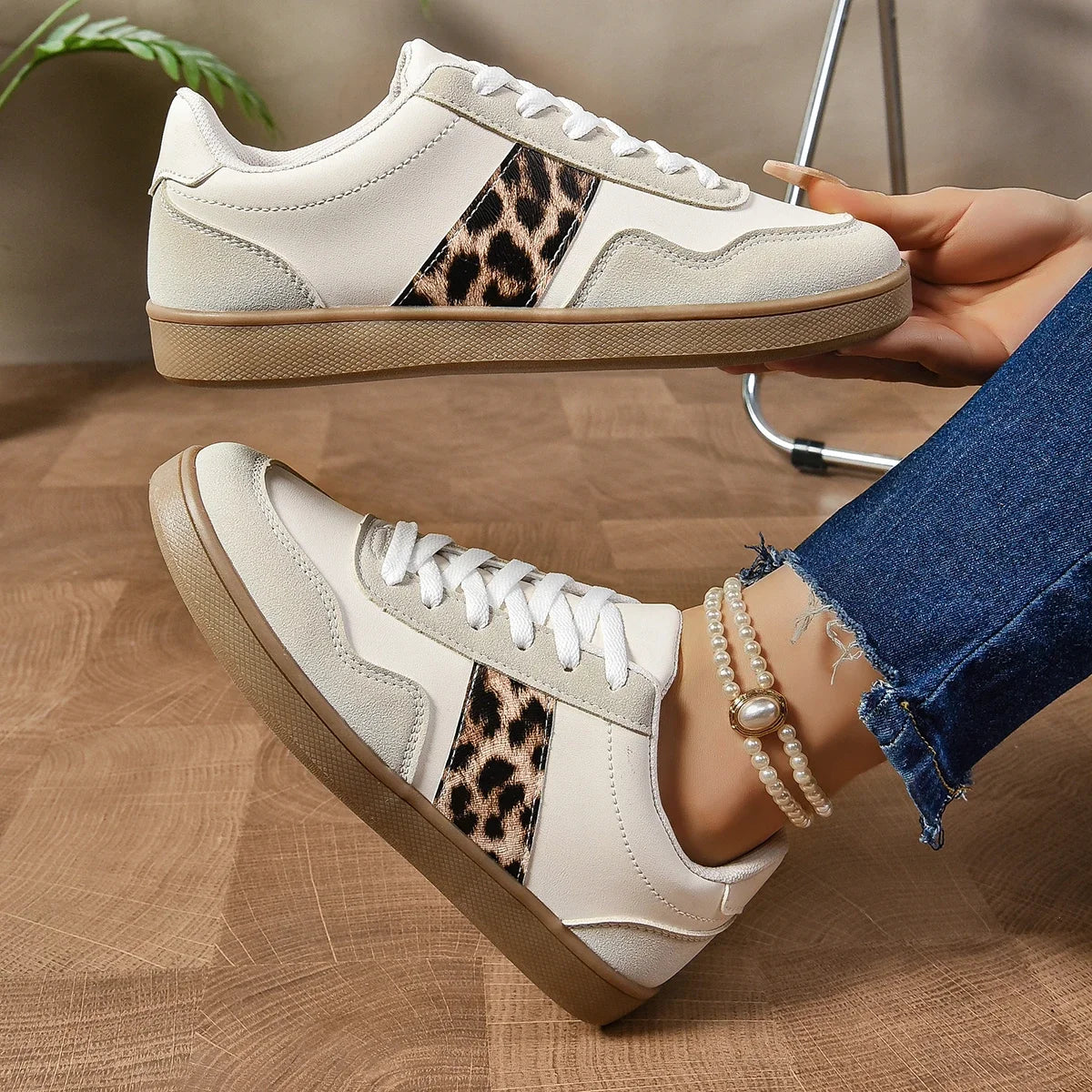 Leopard-print low-top sneakers with suede-texture panels in beige and black
