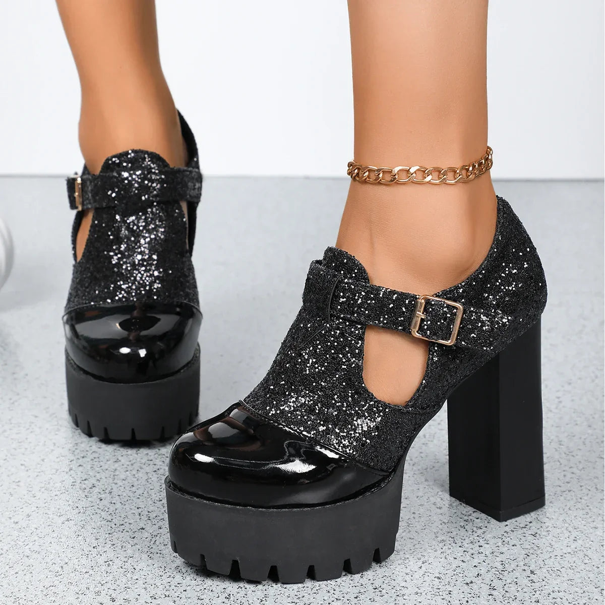 Croc-effect block heel sandals with an adjustable gold-tone front strap and enclosed heel