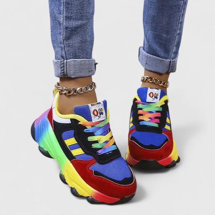 Comfortable women's slip-on sneakers shown in green and blue colourways