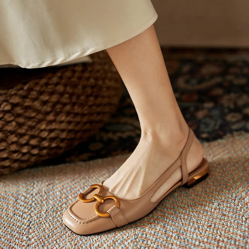 Leather slingback flat with vamp buckle, side cutout and squared toe