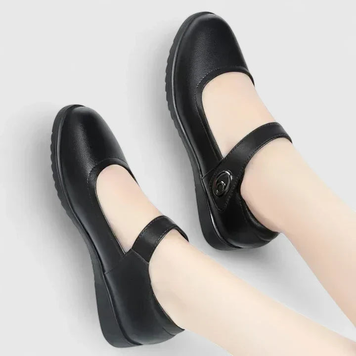 Black comfortable slip-on shoes for women, styled for everyday wear