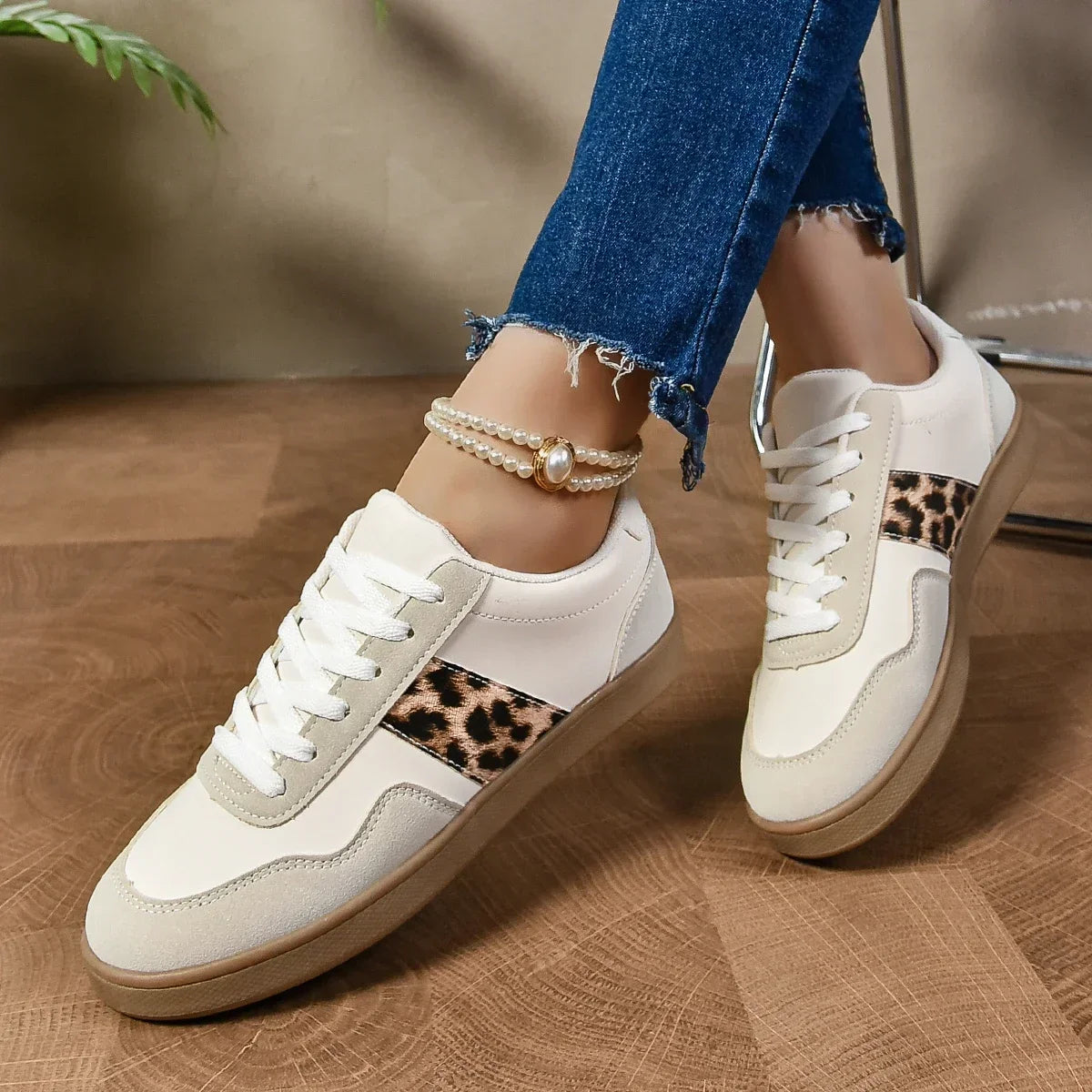 Leopard-print low-top sneakers with suede-texture panels in beige and black