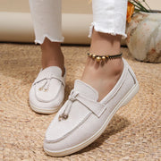 Genuine leather and soft suede slip-on loafers in a neutral shade